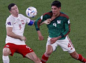 صورة انتهاء مباراة بولندا والمكسيك بالتعادل السلبي